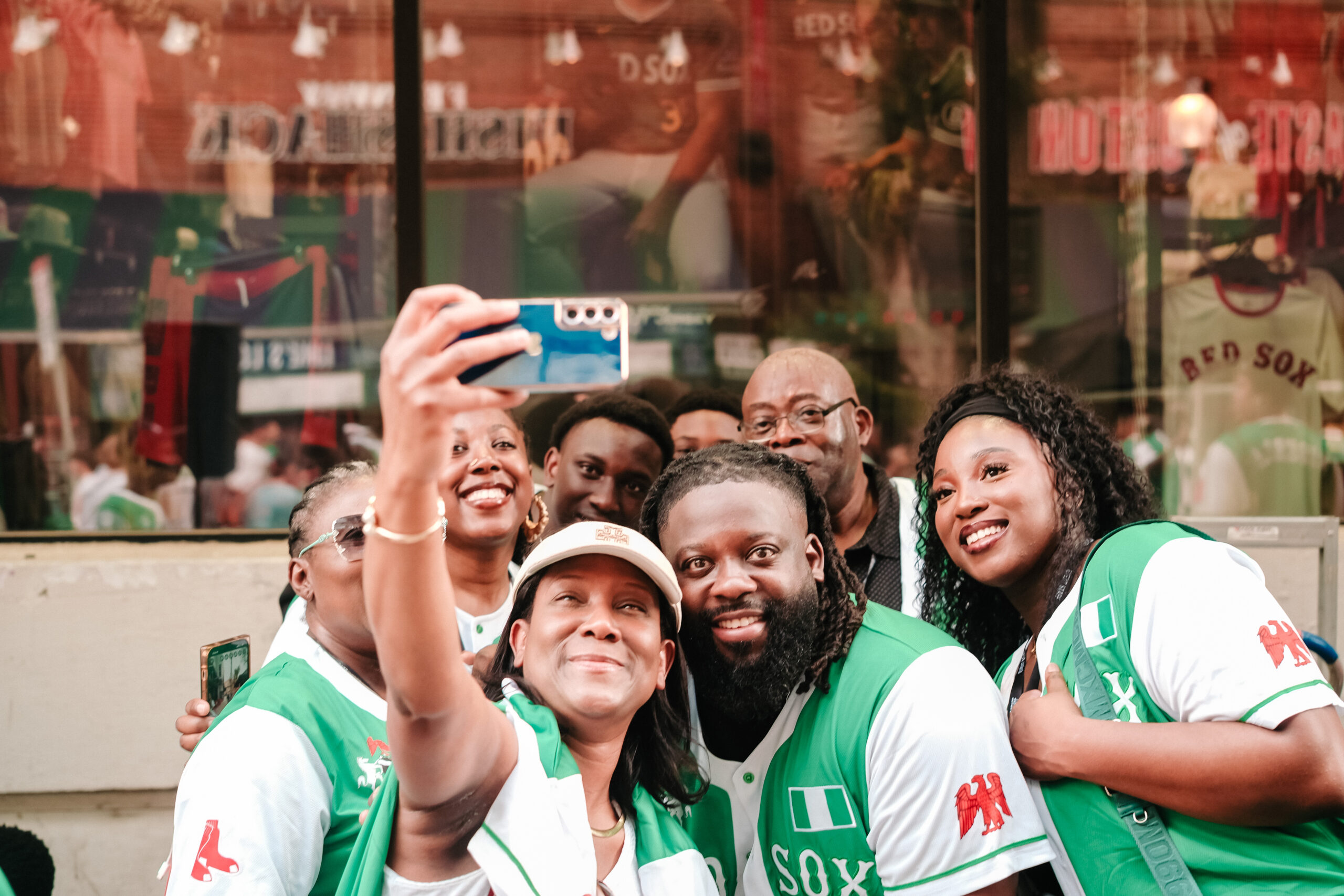 A group of people posing for a selfie. 